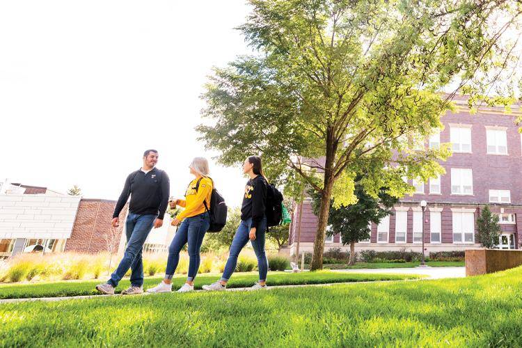 Students walk across campus