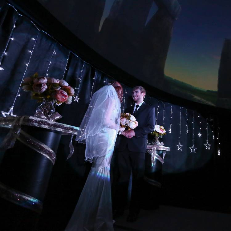 A wedding in the planetarium