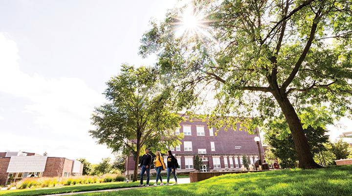 Students walk across campus