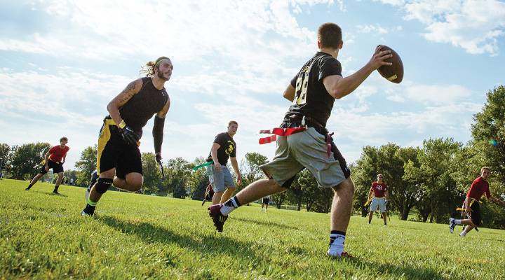 Students playing flag football
