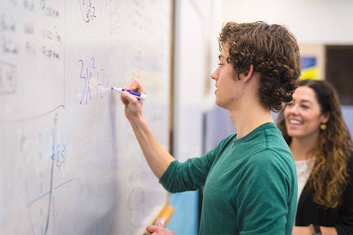 Math Education degree concept featuring a student working on math problems