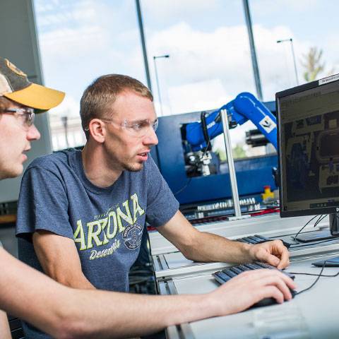 WSC students program the CIM Cell a the Manufacturing Lab