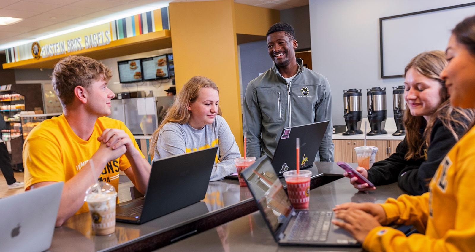 Students spend time together at Einstein Bagel Bros.