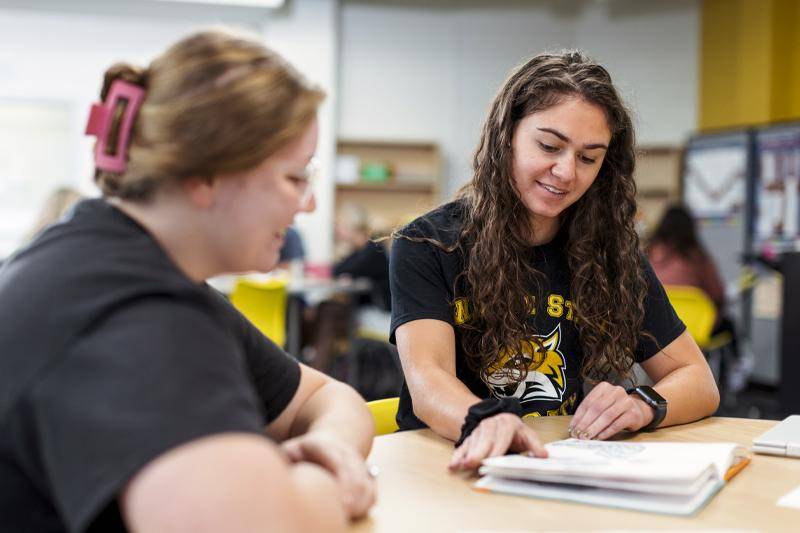 A WSC student works in a classroom