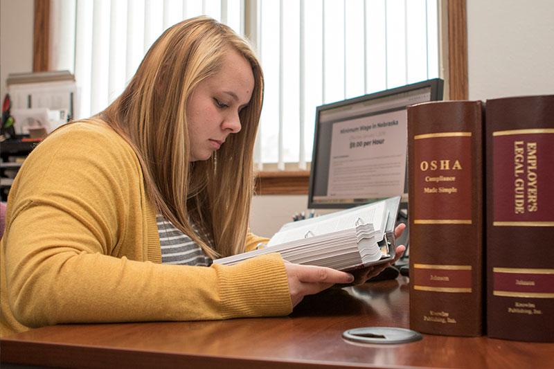 An employee researches human resource policies